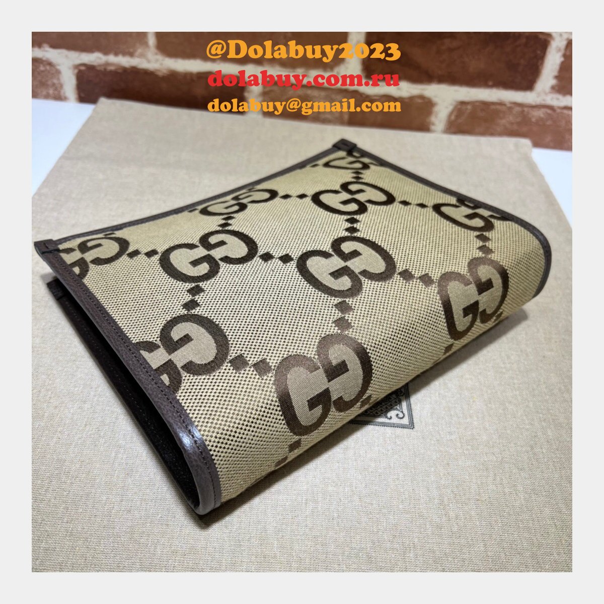 G*u*i replica 699318 clutches jumbo gg pouch camel ebony gg canvas